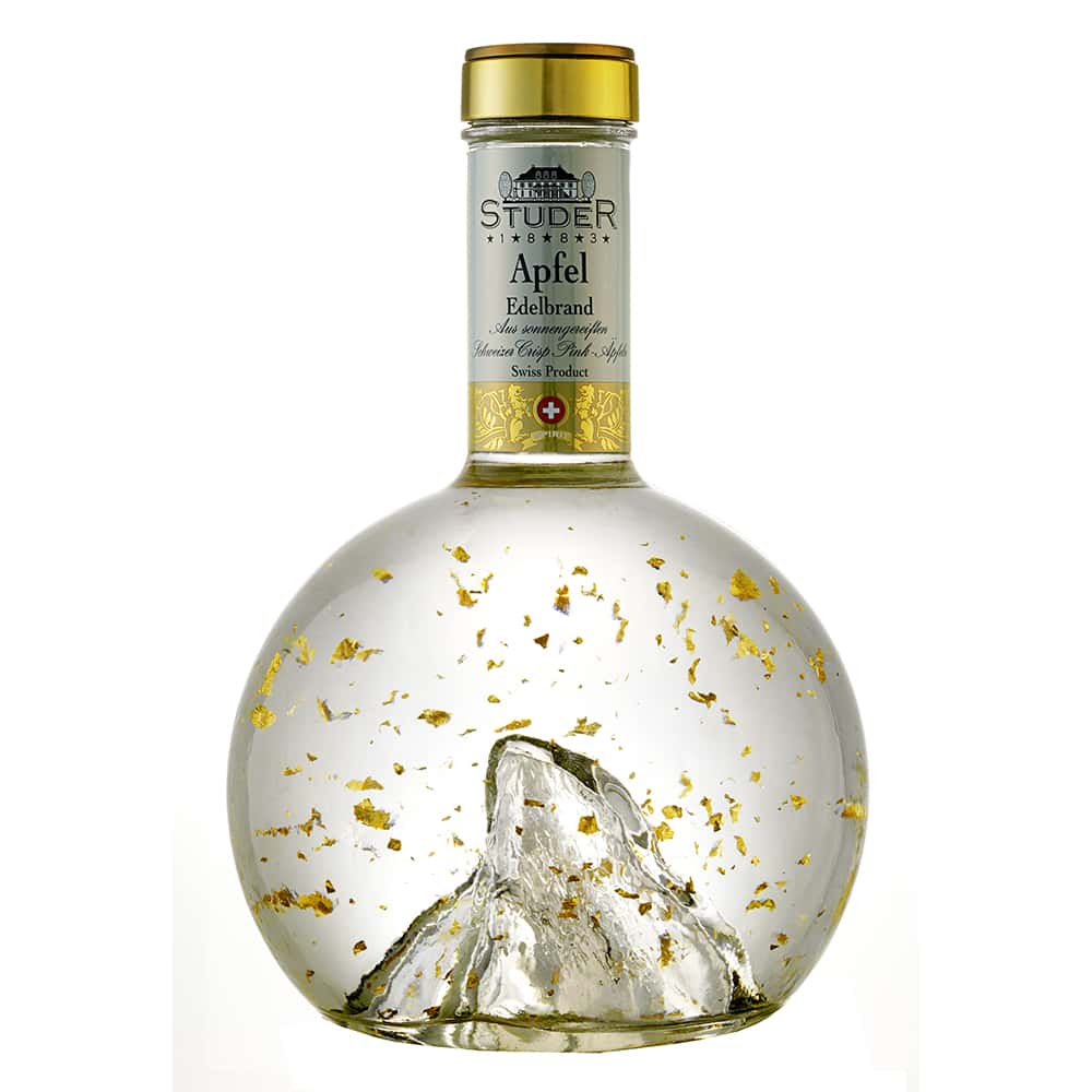Studer Distillerie – Crisp-Pink Apfel mit 24 Karat Gold-Flitter Studer Distillerie - Crisp-Pink Apfel mit 24 Karat Gold-Flitter